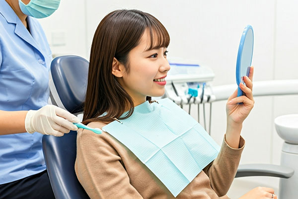 歯科を受診する女性
