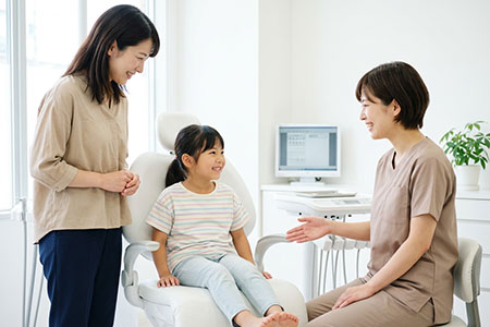 歯科を受診する親子